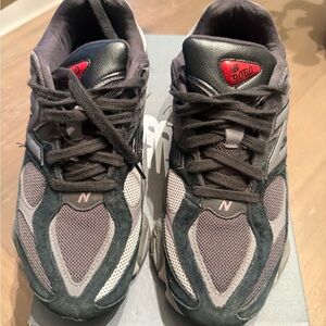 New Balance 9060 Black and Gray Sneakers with Red Accents